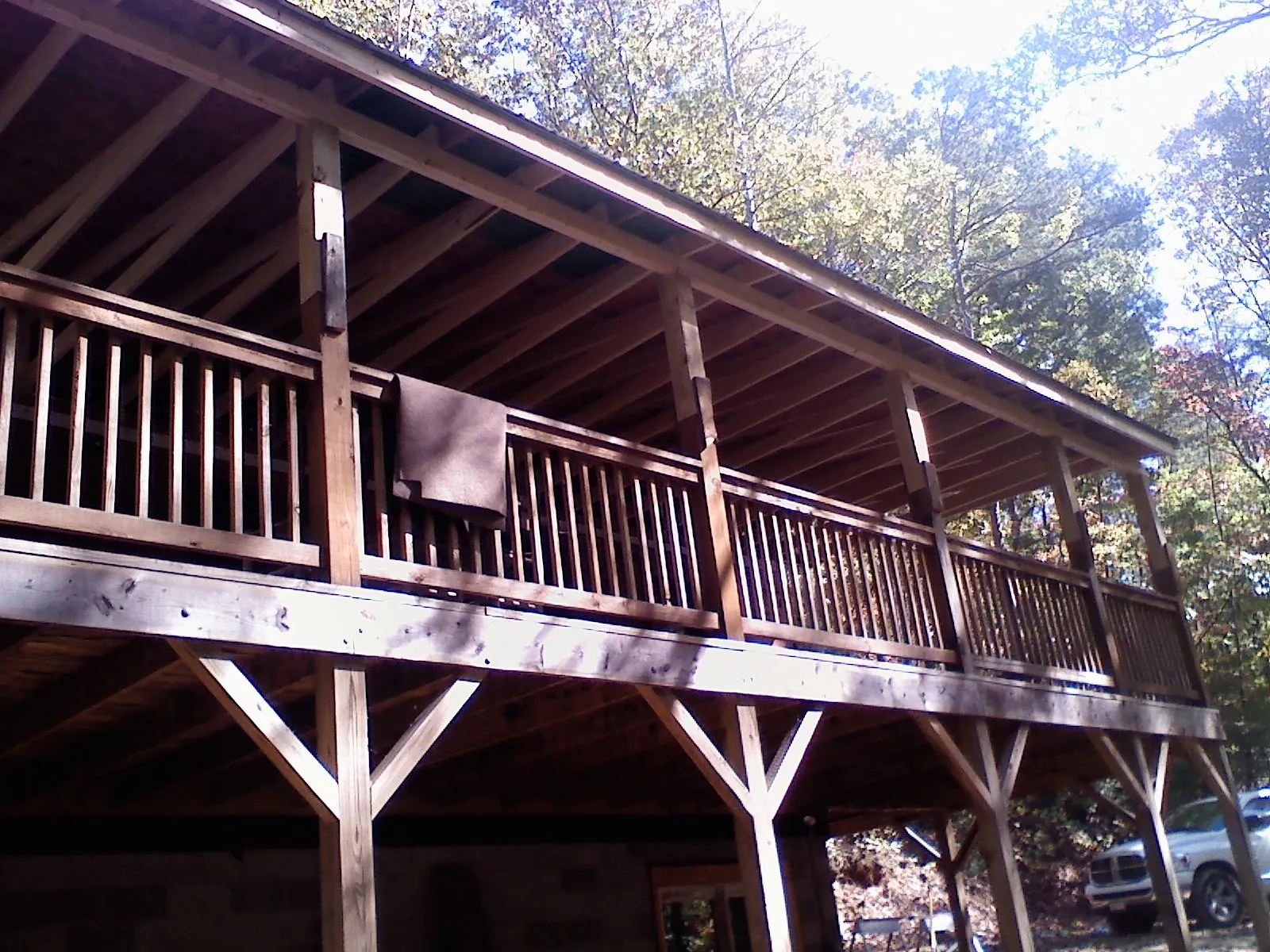 Timber framing under a new elevated porch and deck — Roof Leak Repair in Parrottsville by Roofing Brothers